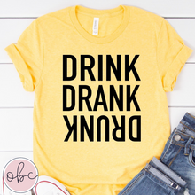 Load image into Gallery viewer, Drink Drank Drunk Graphic Tee